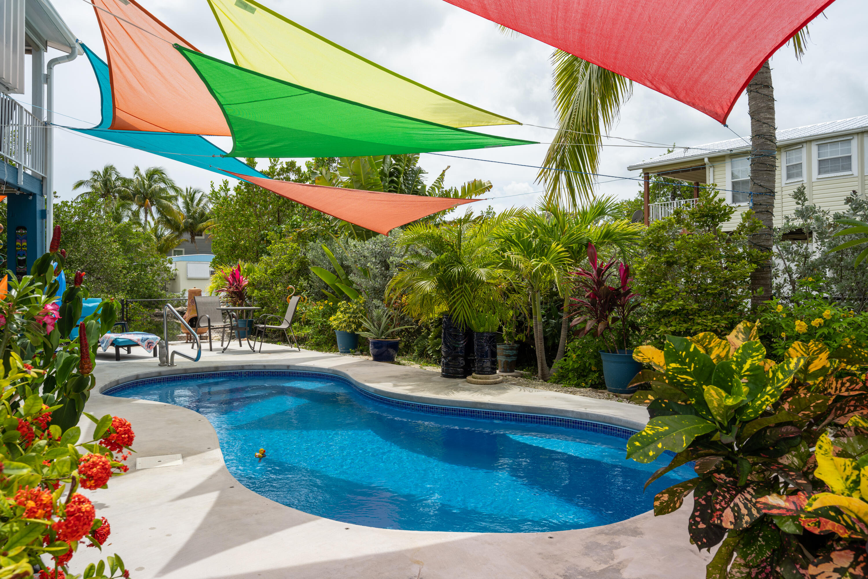 18 West Circle Drive Key West, FL 33040 - Photo 23 of 30 a view of a swimming pool with a patio