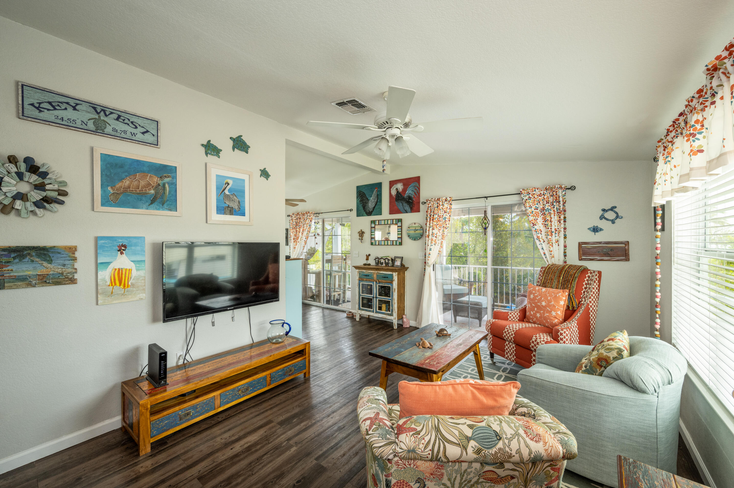 18 West Circle Drive Key West, FL 33040 - Photo 3 of 30 a living room with furniture and a flat screen tv