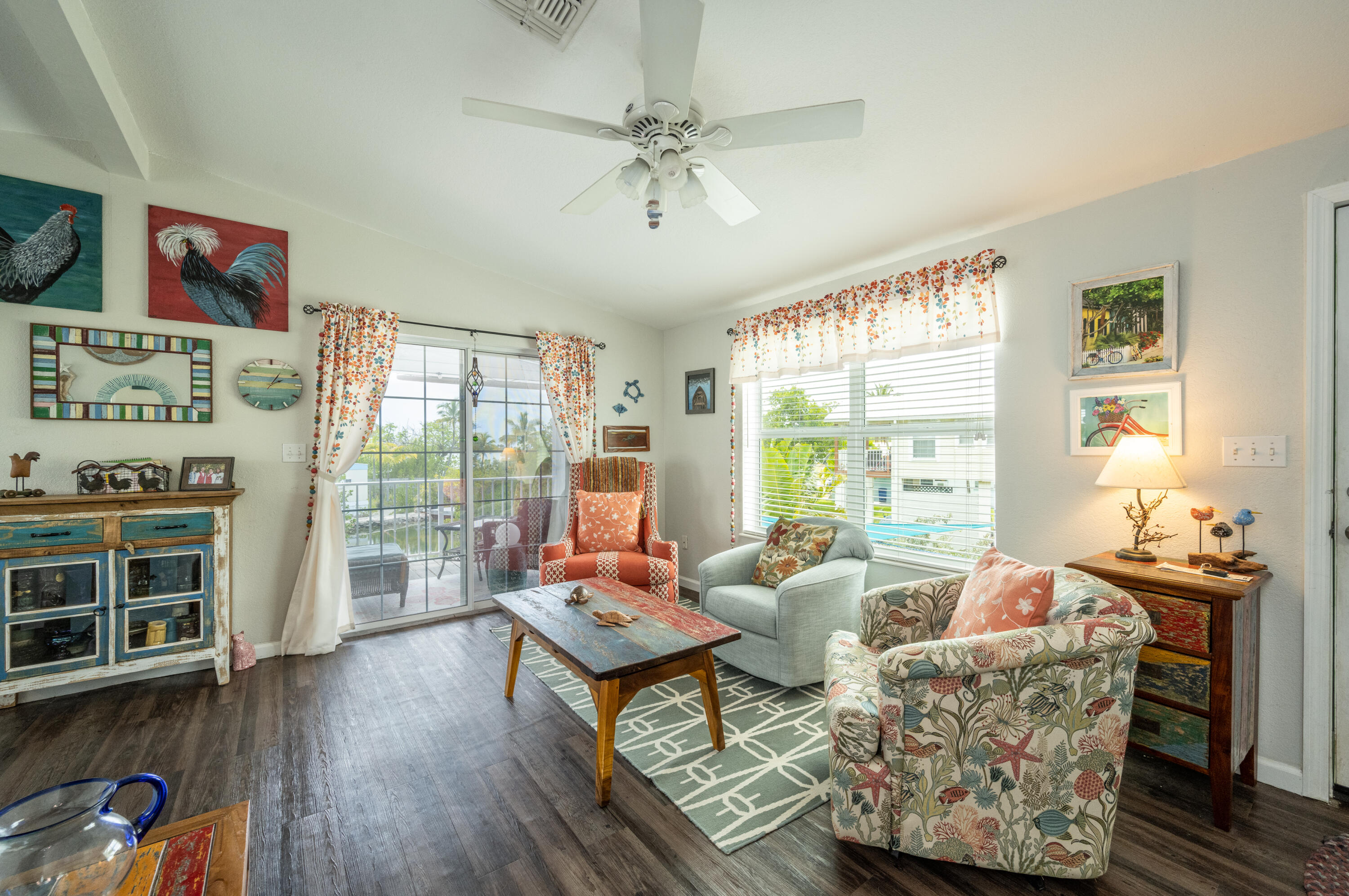 18 West Circle Drive Key West, FL 33040 - Photo 4 of 30 a living room with furniture and a floor to ceiling window