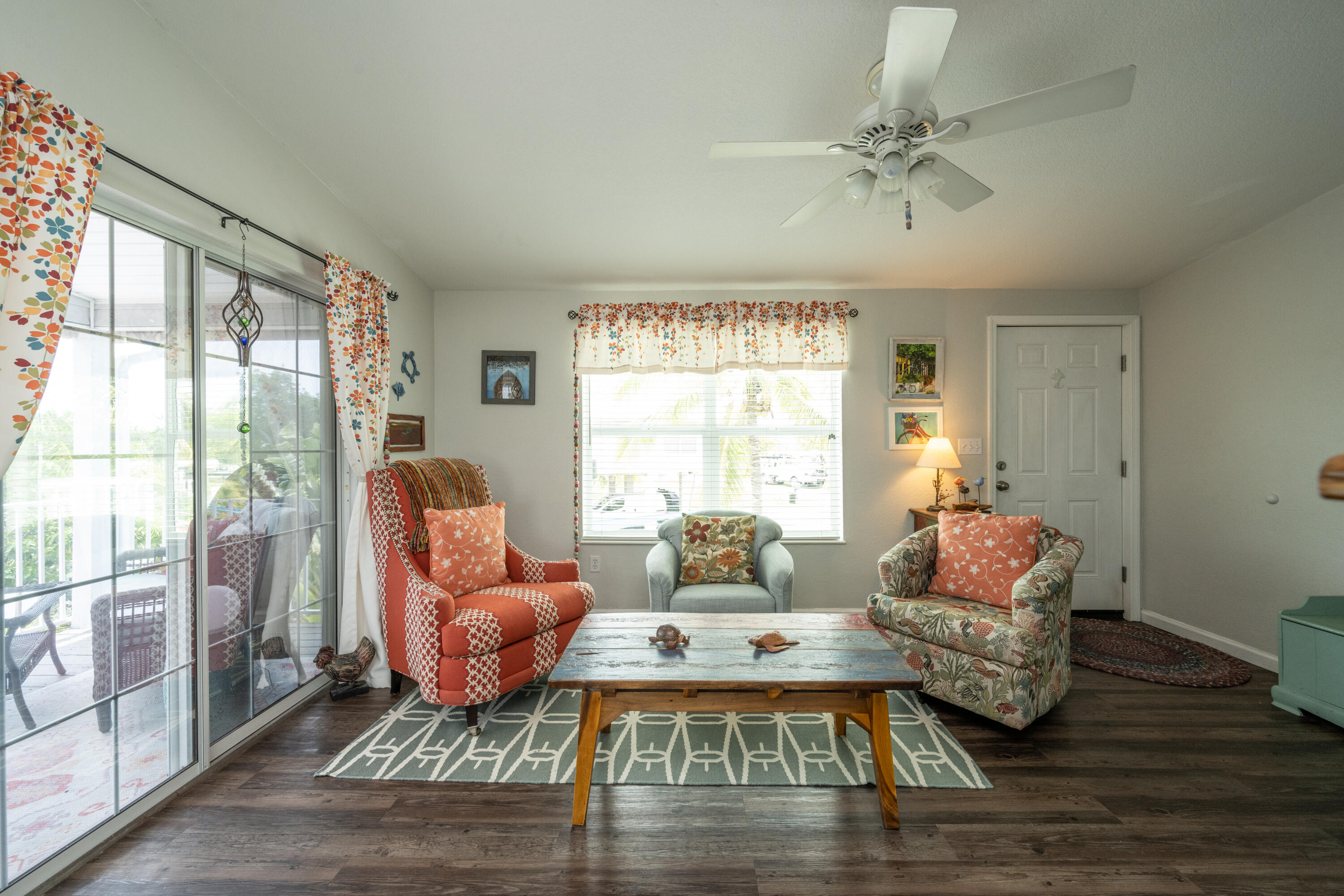 18 West Circle Drive Key West, FL 33040 - Photo 5 of 30 a living room with furniture rug and wooden floor