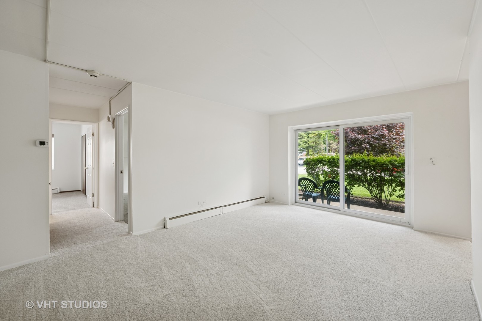 801 East Miner Street, Unit 1A Arlington Heights, IL 60004 - Photo 15 of 21 a view of an empty room with a window