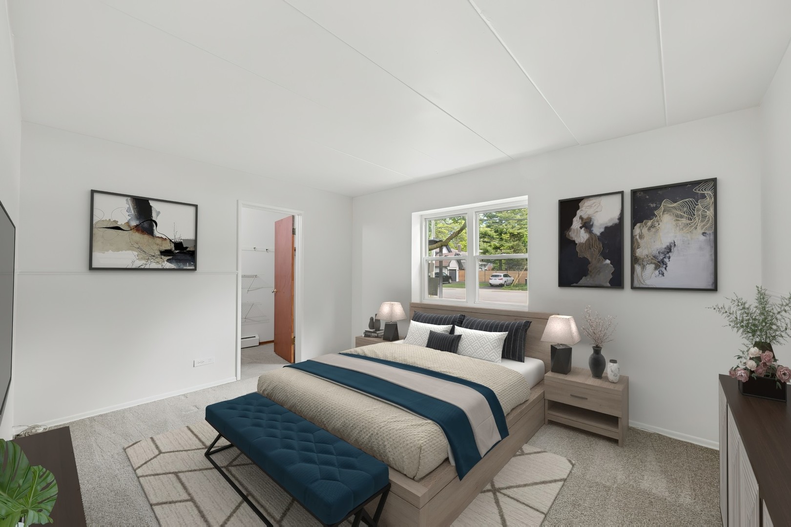 801 East Miner Street, Unit 1A Arlington Heights, IL 60004 - Photo 3 of 21 a bedroom with a large bed and a window