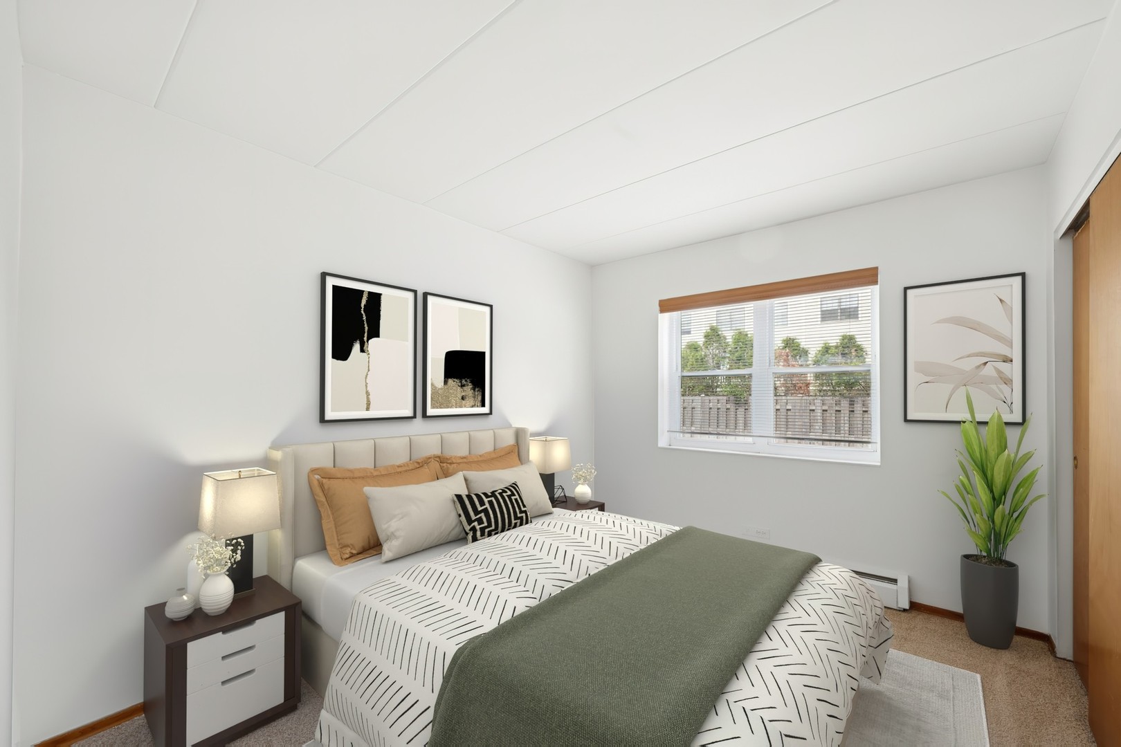 801 East Miner Street, Unit 1A Arlington Heights, IL 60004 - Photo 5 of 21 a bedroom with a bed and a window