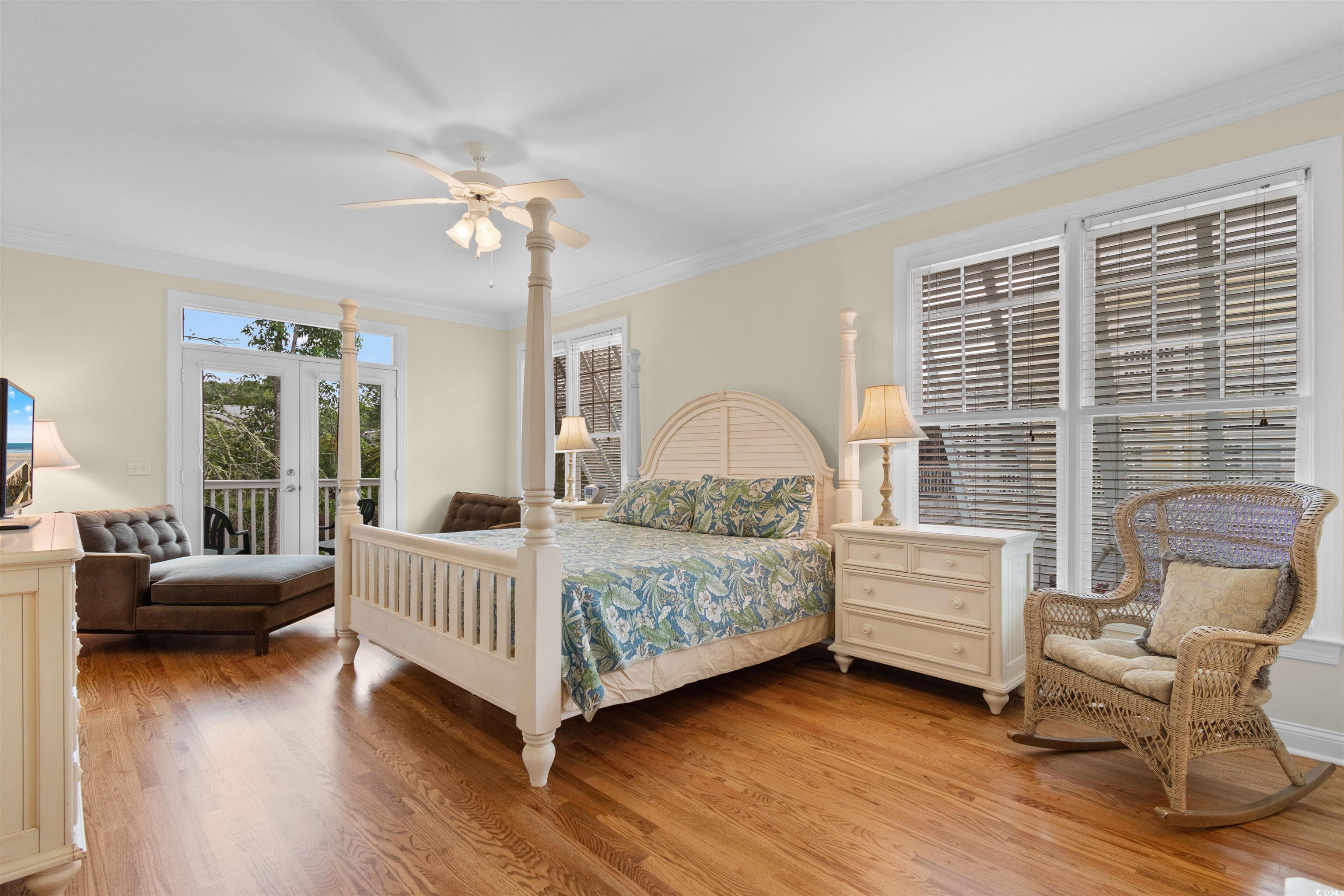 141 Cayman Loop Pawleys Island, SC 29585 - Photo 14 of 40 Bedroom with access to exterior, wood finished floors, crown molding, and ceiling fan