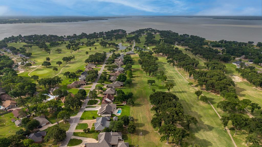 101 Lighthouse Lane Mabank, TX 75143 - Photo 38 of 40 Aerial perspective of a golf course community with direct waterfront access