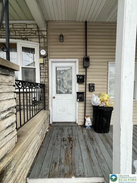 40 Clay Street, Unit 2 New Philadelphia, PA 17959 - Photo 2 of 8 a view of a balcony with wooden floor