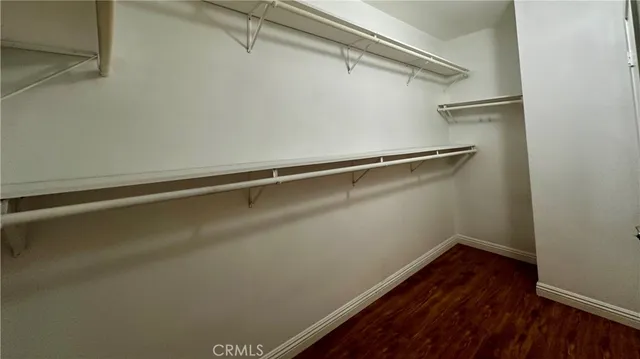 a bathroom with a shower and toilet