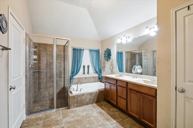 a bedroom with a bed and dresser