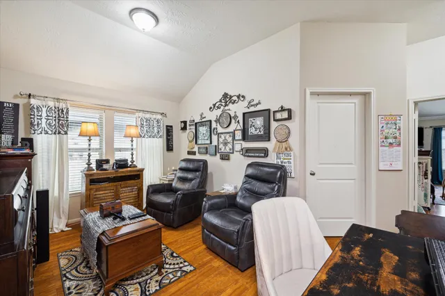 a view of a workspace with furniture and toys
