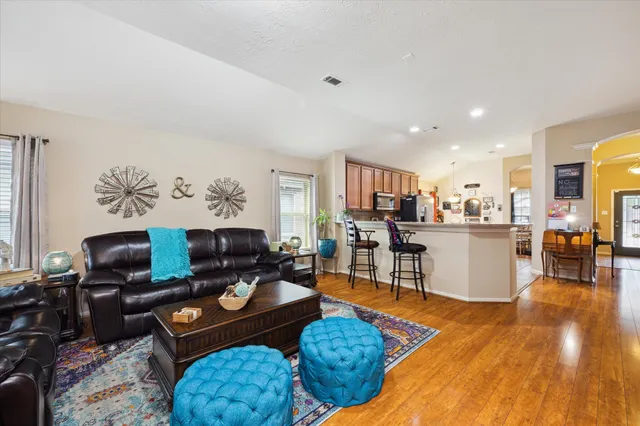 a view of a street with a building in the background