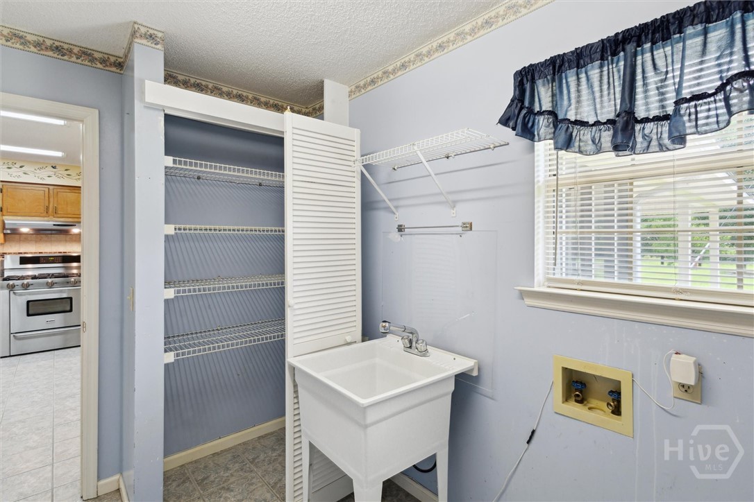 500 Archer Road Guyton, GA 31312 - Photo 35 of 50 Pantry inside Laundry Room