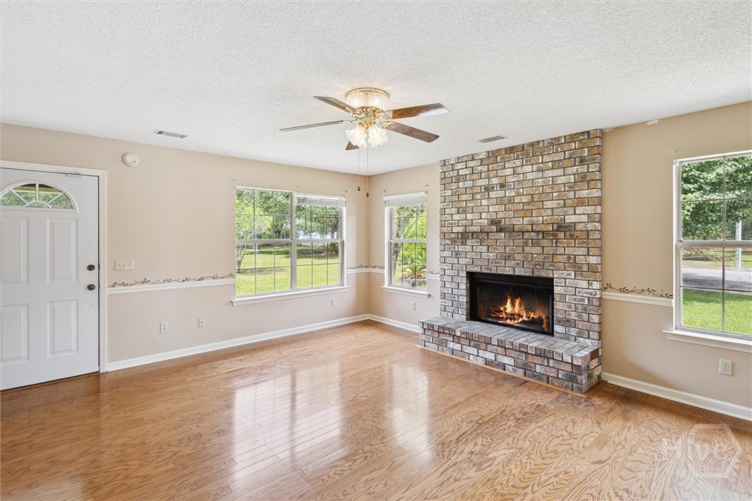 500 Archer Road Guyton, GA 31312 - Photo 8 of 50 Great Room with Wood Burning Fireplace