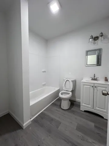 a bathroom with a sink and a toilet