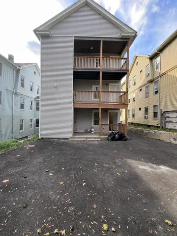 a view of a house with a street