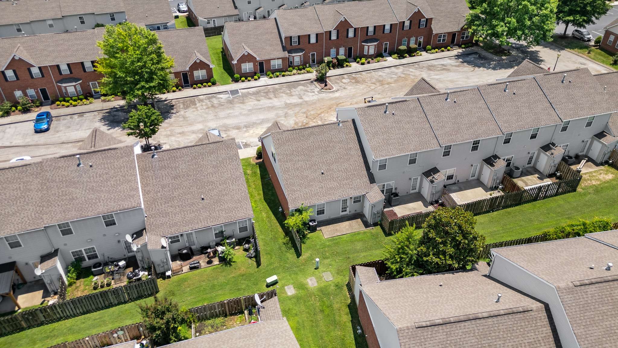 1101 Downs Boulevard, Unit 112 Franklin, TN 37064 - Photo 29 of 35 an aerial view of multiple houses with yard
