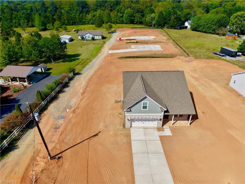 5158 Paramount Road, Unit 1062 Pfafftown, NC 27040 - Photo 2 of 27 Grass / Straw to be added to rear yard.