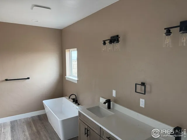 a bathroom with a sink and a vanity