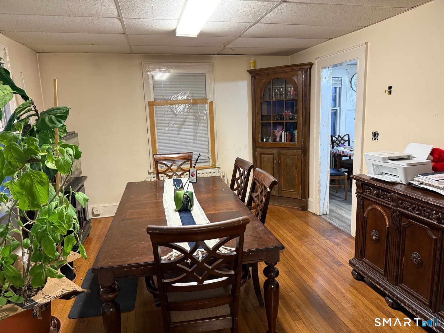 3461 East Main Street Bridgeport, CT 06606 - Photo 14 of 40 a view of a dining room with furniture and wooden floor