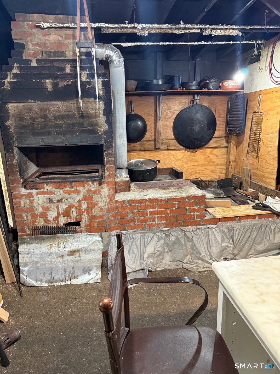 3461 East Main Street Bridgeport, CT 06606 - Photo 15 of 40 a kitchen with a stove a refrigerator and a stove