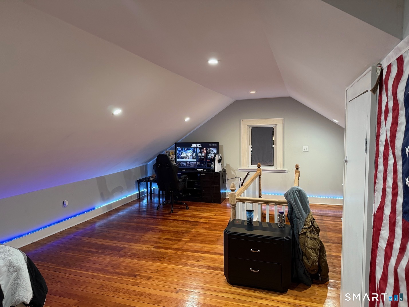 3461 East Main Street Bridgeport, CT 06606 - Photo 23 of 40 a living room with furniture and a flat screen tv