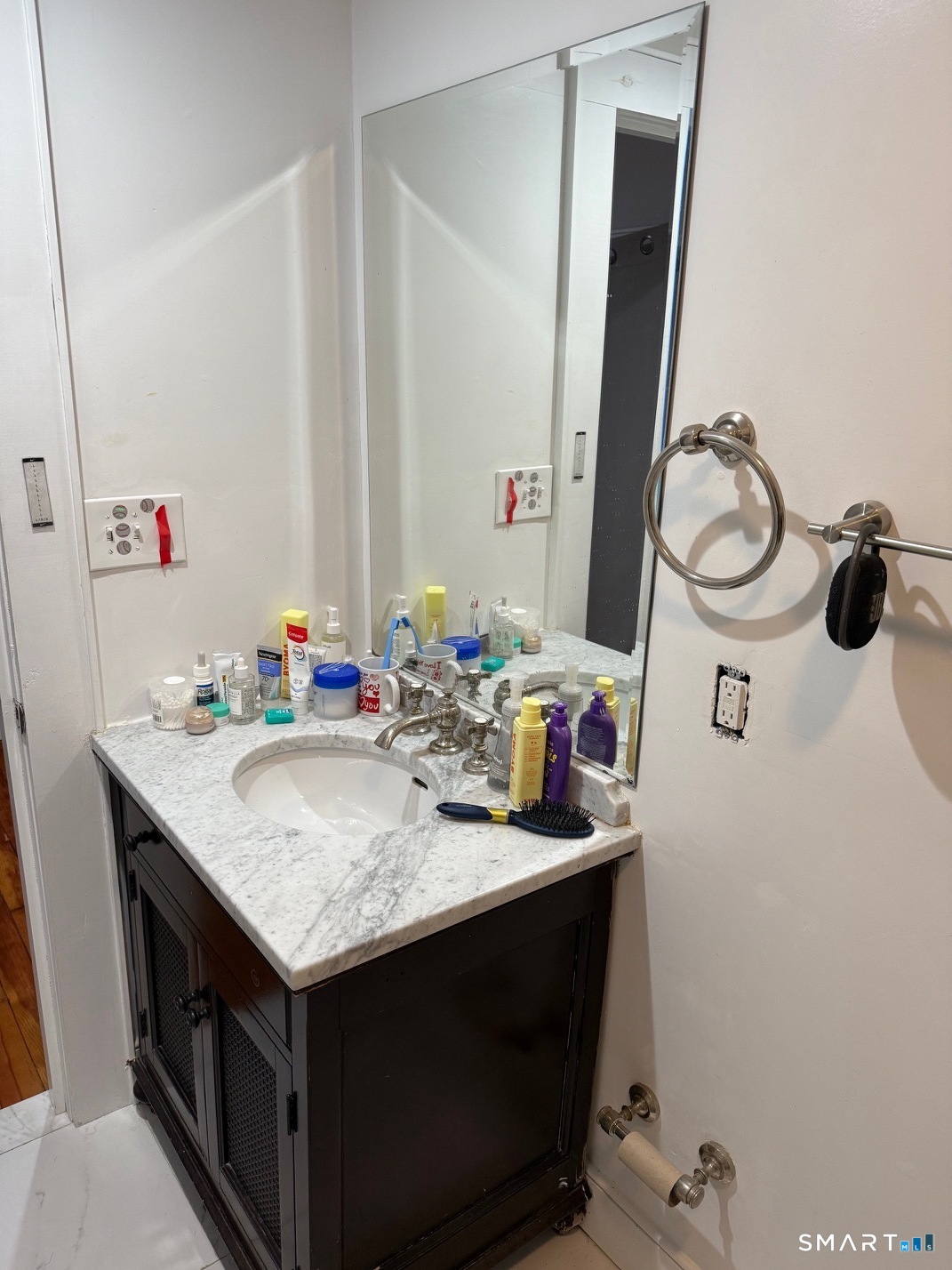 3461 East Main Street Bridgeport, CT 06606 - Photo 28 of 40 a bathroom with a sink vanity and a mirror