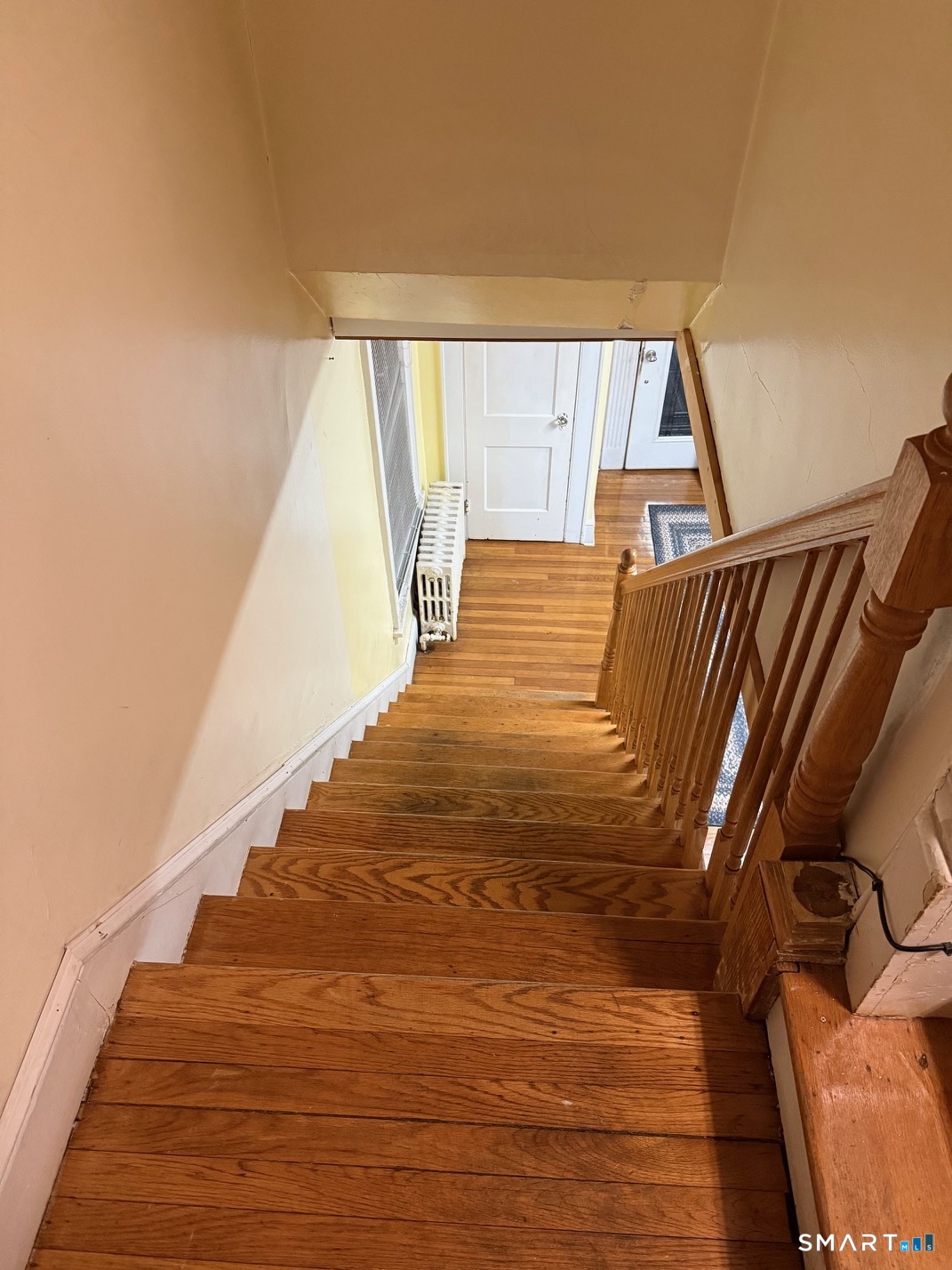 3461 East Main Street Bridgeport, CT 06606 - Photo 30 of 40 a view of an empty room and wooden floor