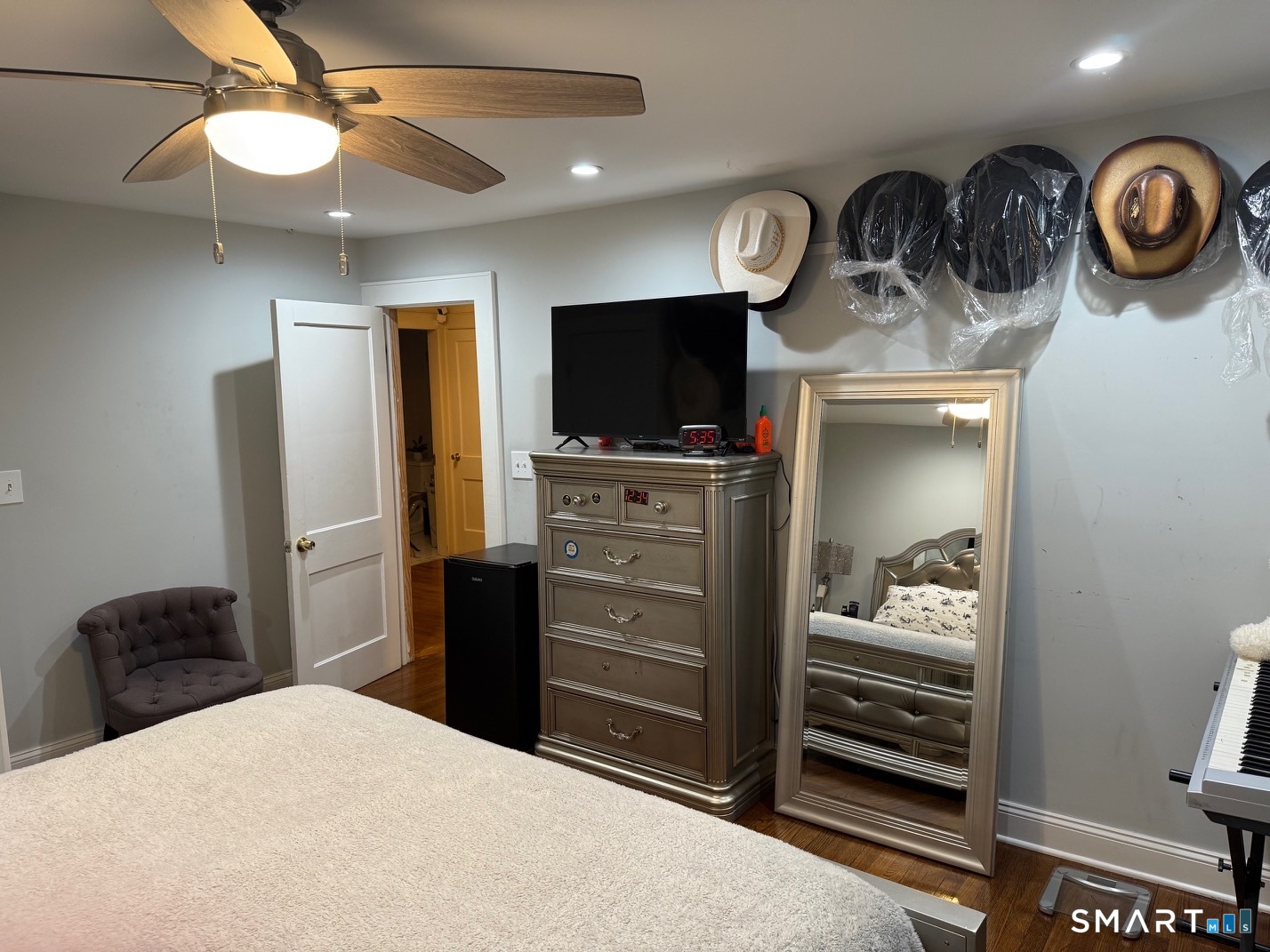 3461 East Main Street Bridgeport, CT 06606 - Photo 35 of 40 a bedroom with a bed and a television in it