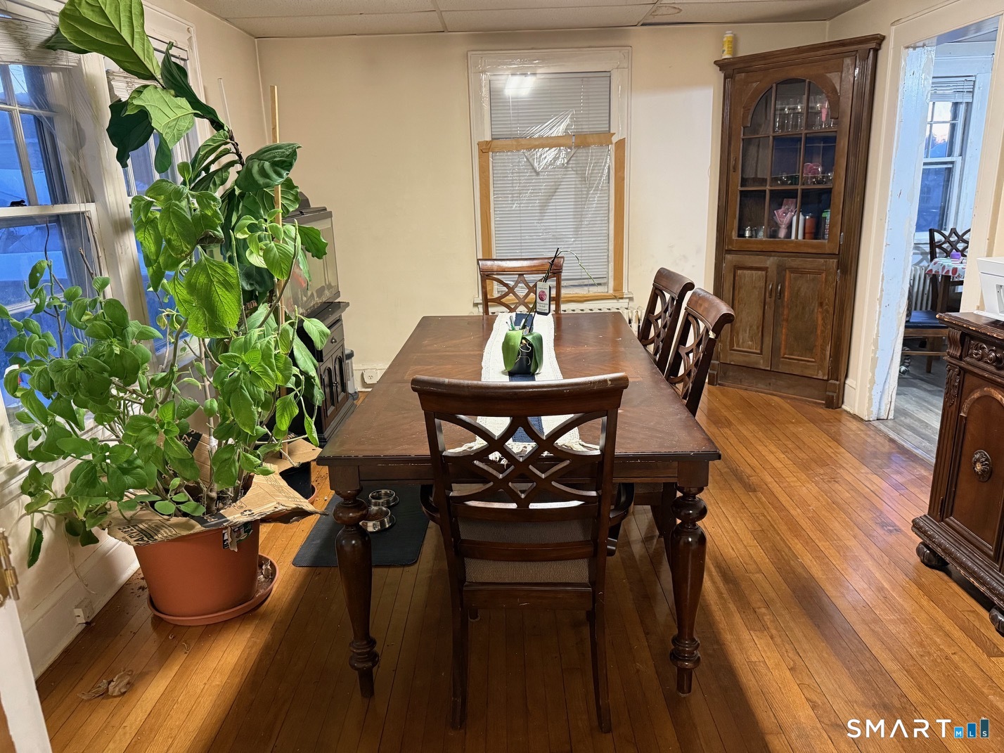 3461 East Main Street Bridgeport, CT 06606 - Photo 8 of 40 a view of a dining room with furniture and wooden floor