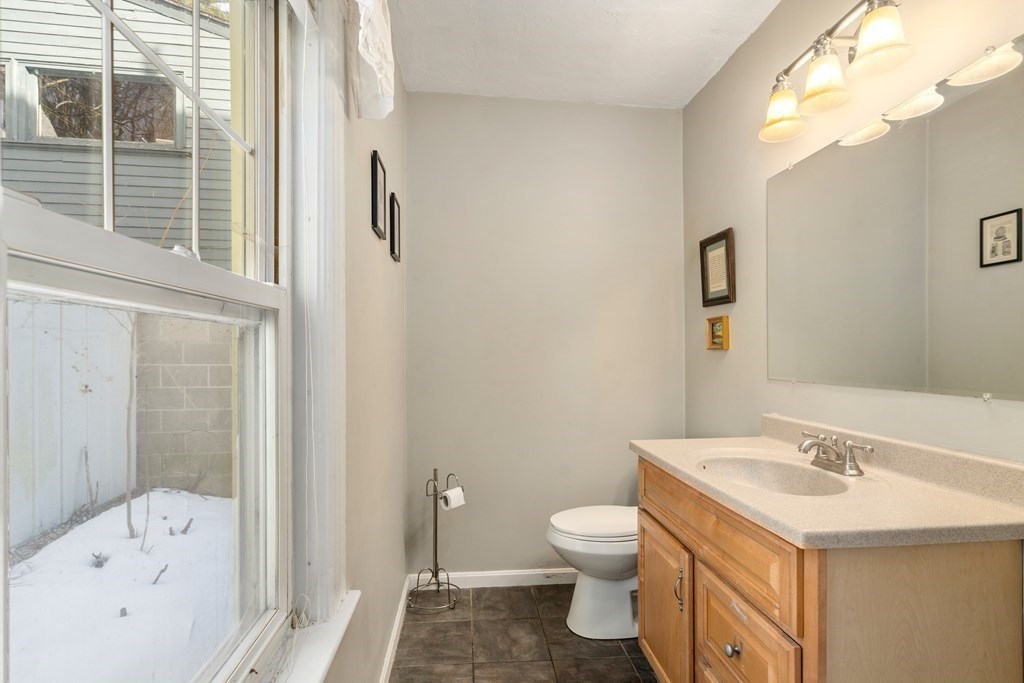 103 Beaconsfield Road Worcester, MA 01602 - Photo 14 of 33 a bathroom with a sink toilet and shower