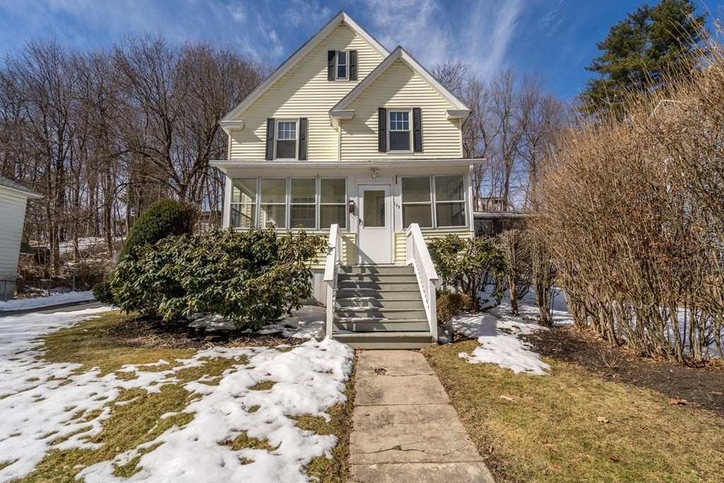 103 Beaconsfield Road Worcester, MA 01602 - Photo 2 of 33 a front view of a house with a yard