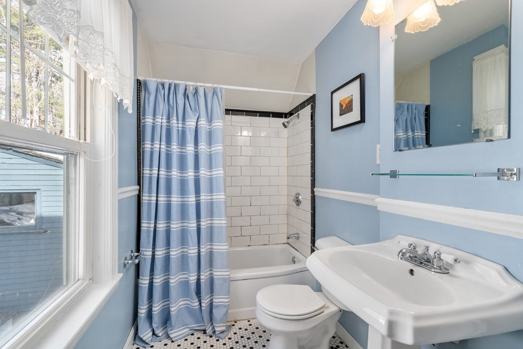 103 Beaconsfield Road Worcester, MA 01602 - Photo 22 of 33 a bathroom with a sink toilet and shower
