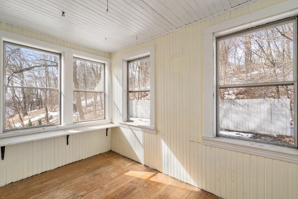 103 Beaconsfield Road Worcester, MA 01602 - Photo 23 of 33 a view of an empty room with a window