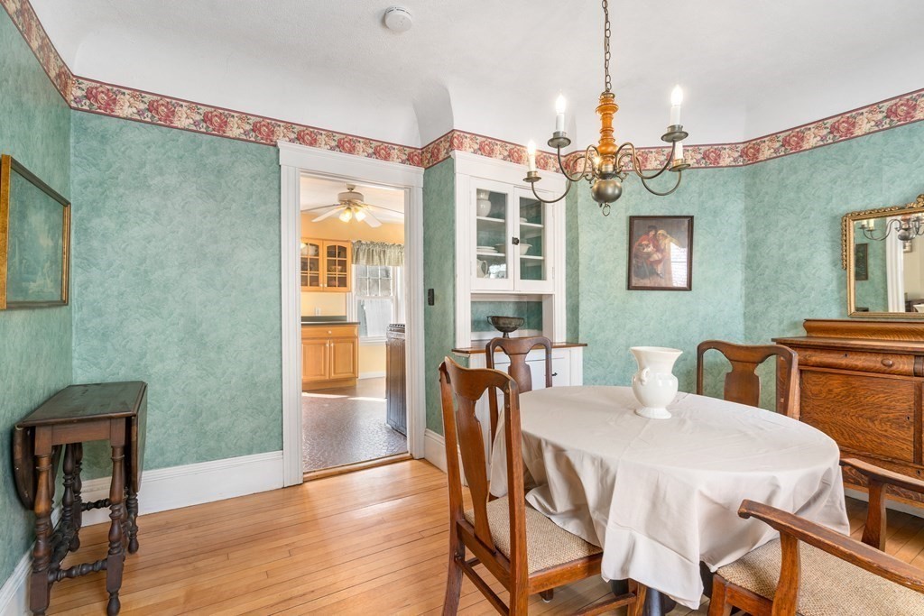 103 Beaconsfield Road Worcester, MA 01602 - Photo 6 of 33 a dinning room with furniture and wooden floor