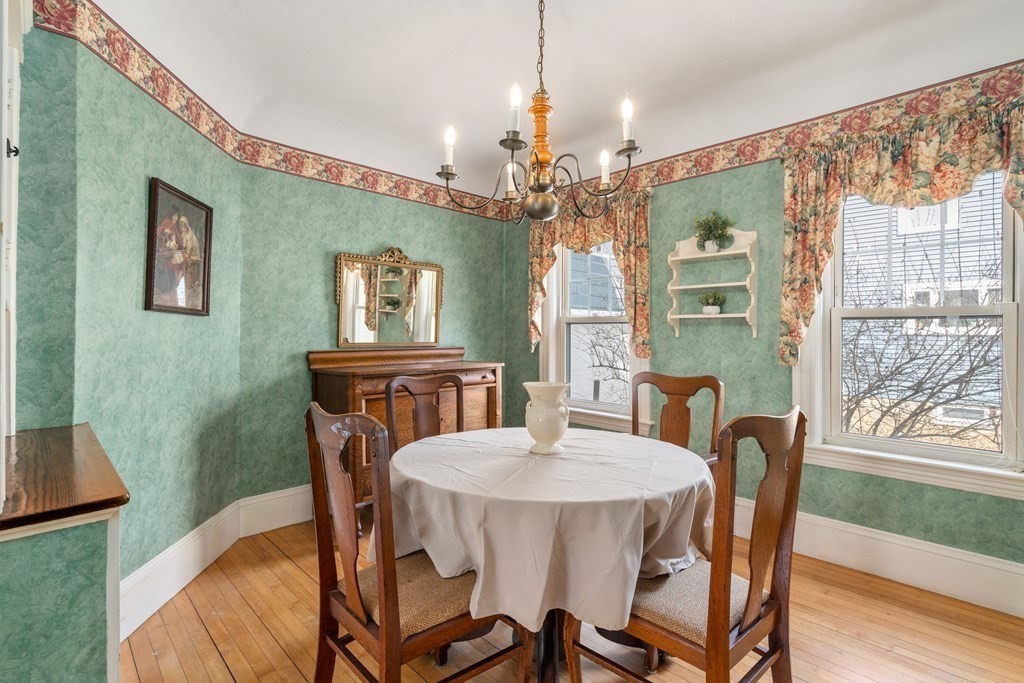 103 Beaconsfield Road Worcester, MA 01602 - Photo 7 of 33 a view of a dining room with furniture window and wooden floor