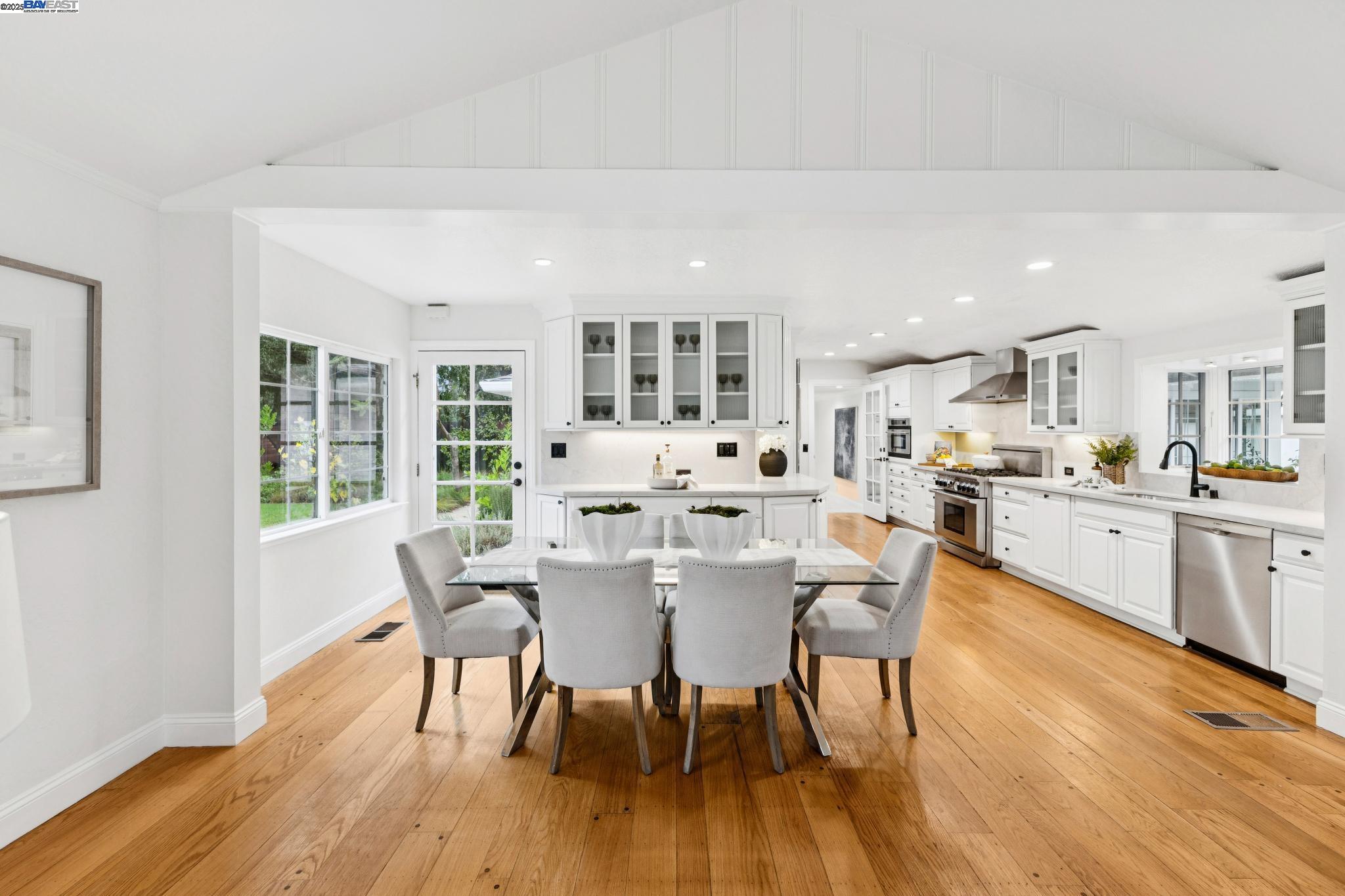 55 Cora Court Walnut Creek, CA 94597 - Photo 11 of 60 a view of a dining room with furniture and wooden floor