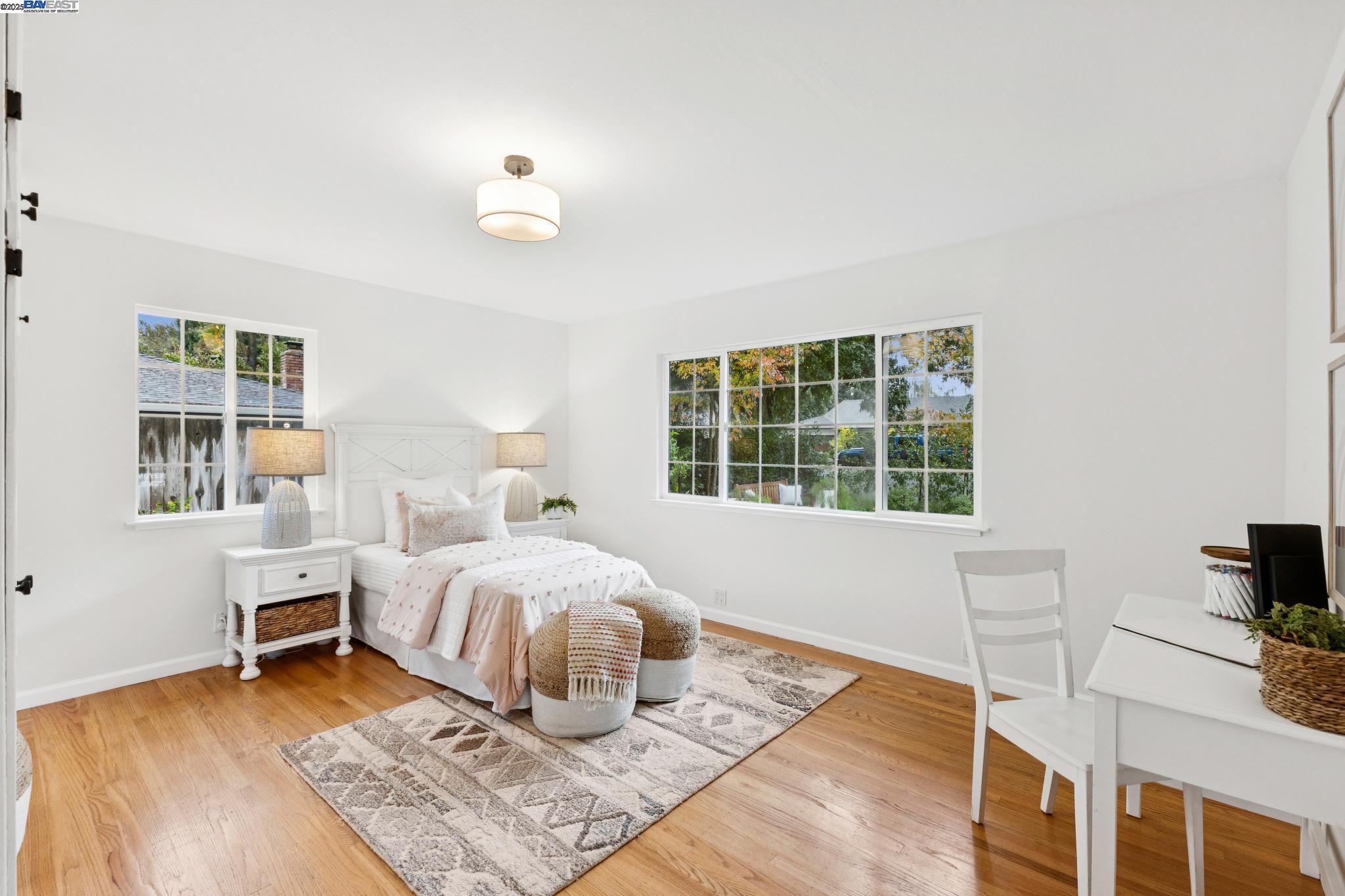 55 Cora Court Walnut Creek, CA 94597 - Photo 26 of 60 a bedroom with a bed and a window