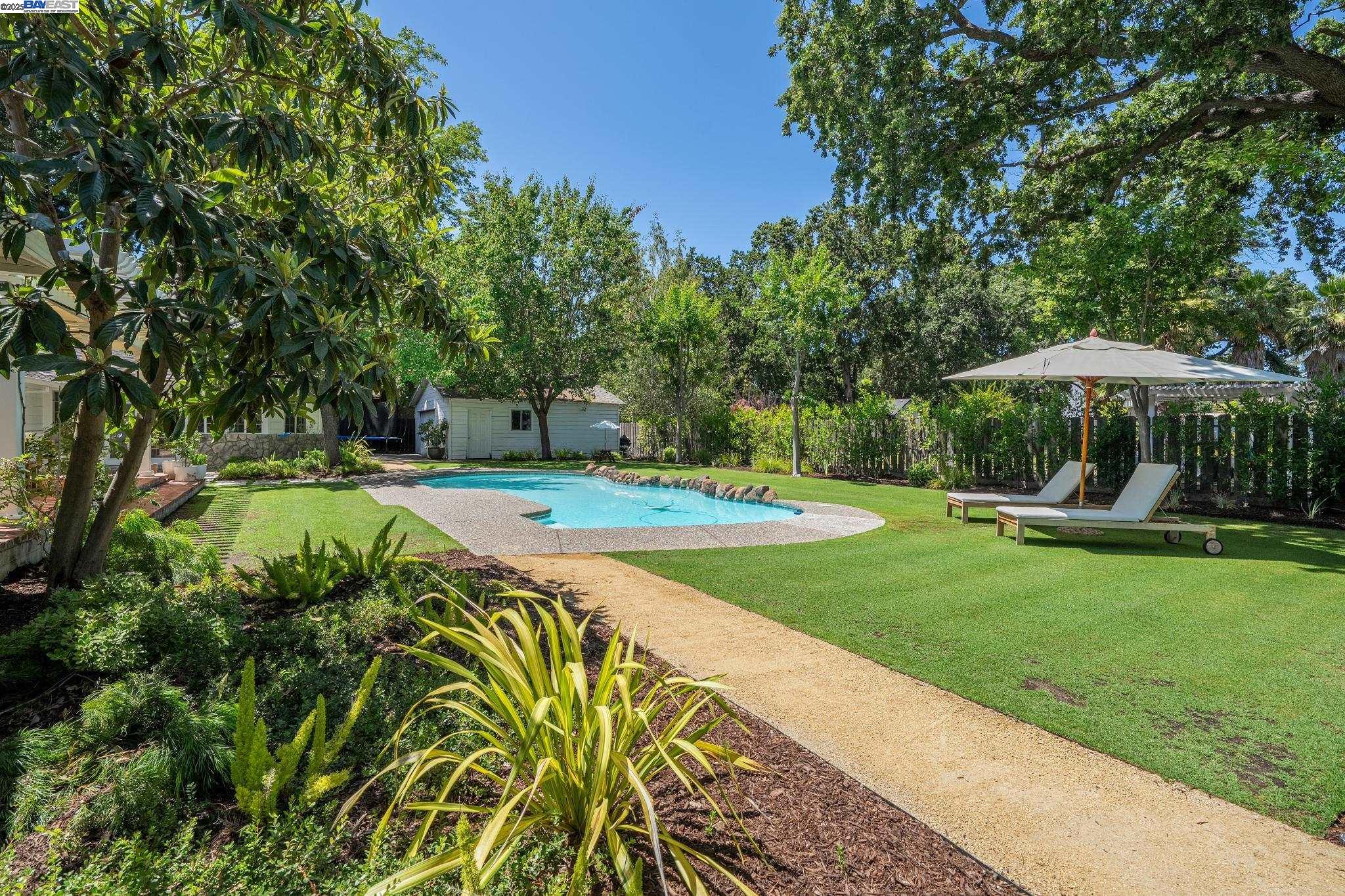 55 Cora Court Walnut Creek, CA 94597 - Photo 43 of 60 a view of a swimming pool with a patio