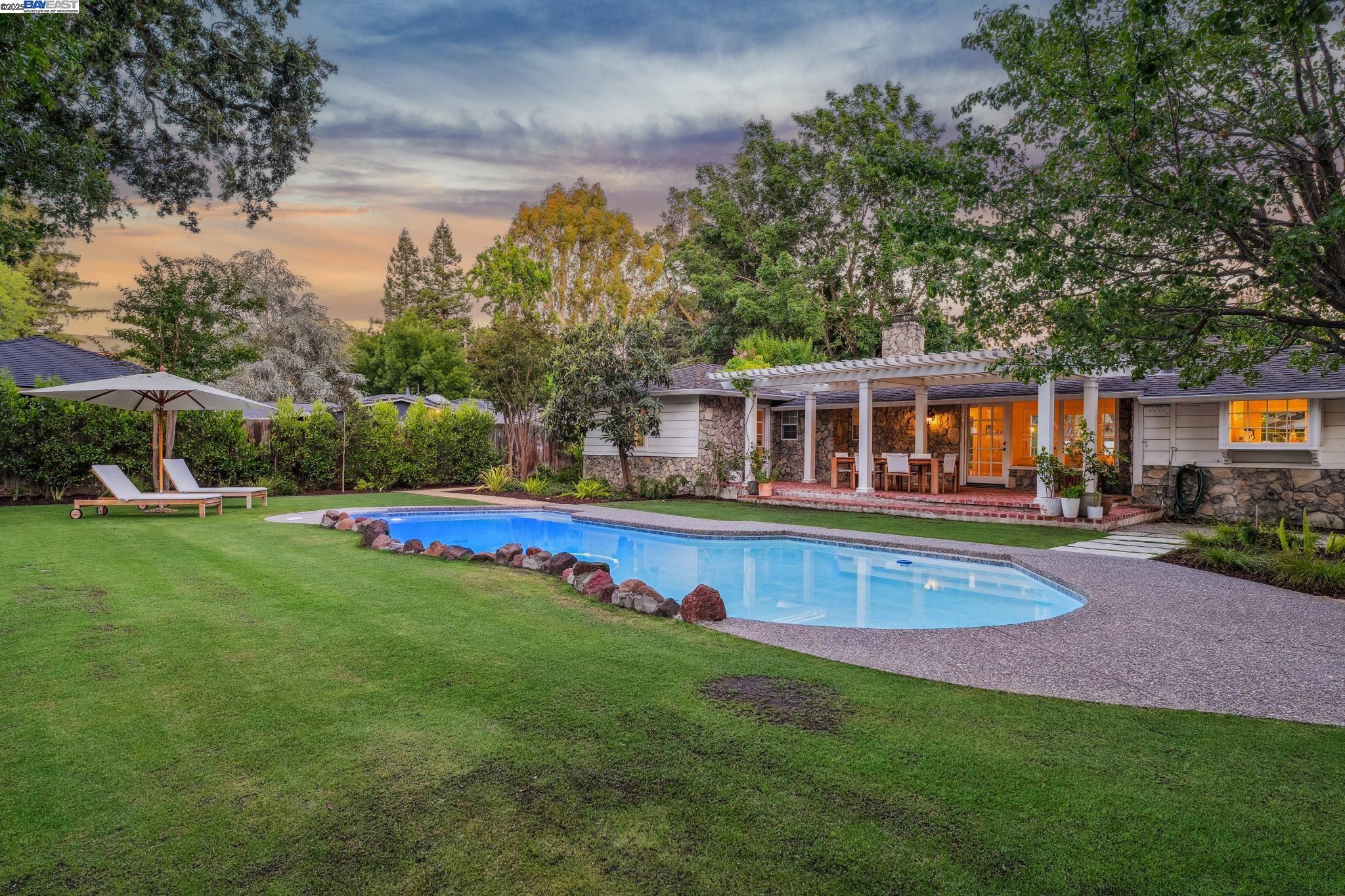 55 Cora Court Walnut Creek, CA 94597 - Photo 52 of 60 a view of house with outdoor space and swimming pool