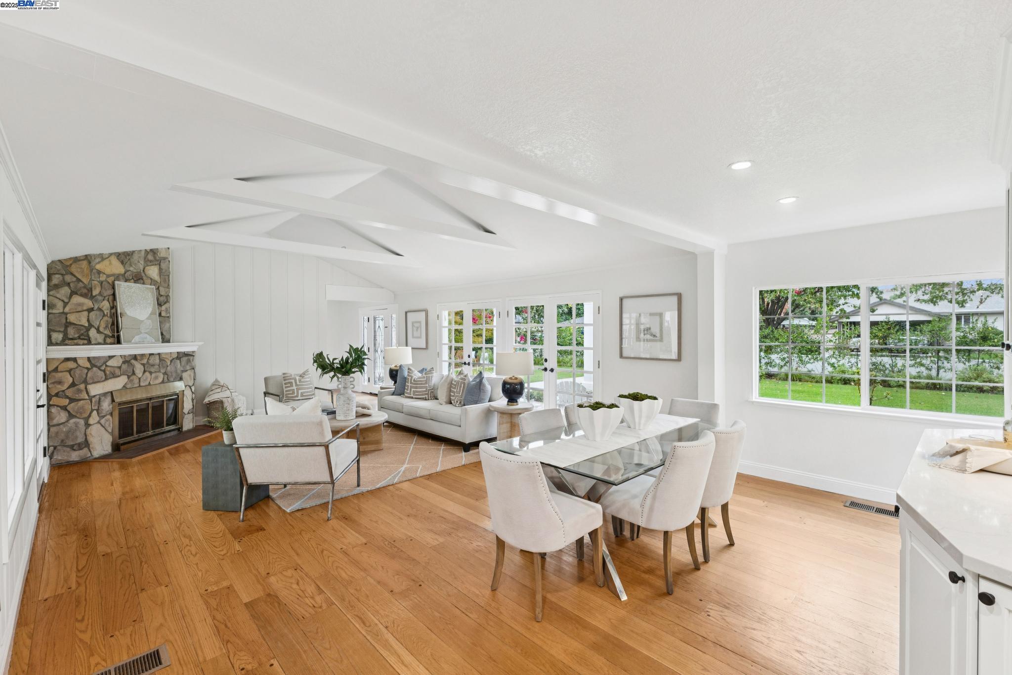 55 Cora Court Walnut Creek, CA 94597 - Photo 10 of 60 a living room with fireplace furniture and a large window