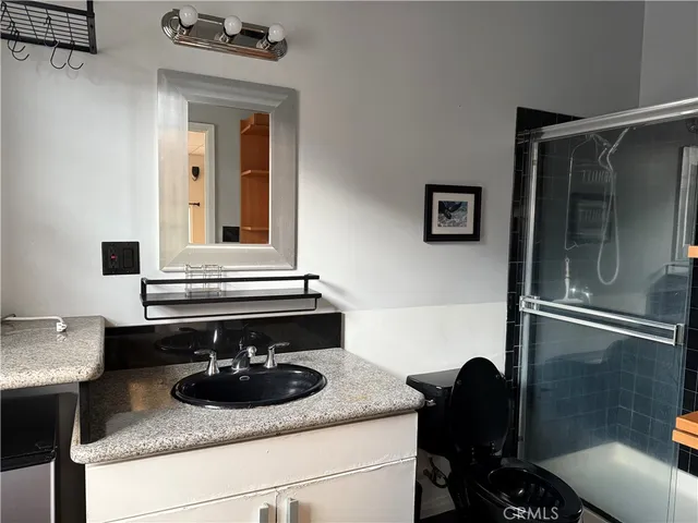 a room with a sink and a stove