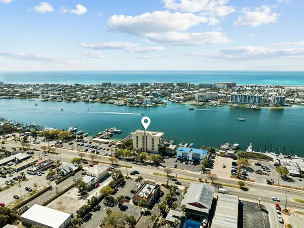 an aerial view of a ocean with city view