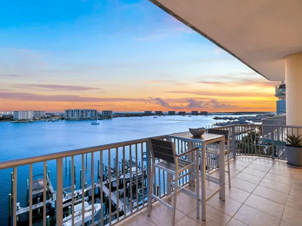 a view of a balcony with an ocean view
