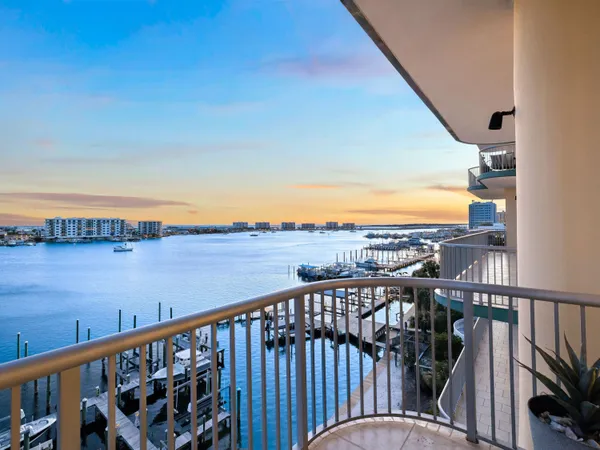 a view of a balcony with an ocean view