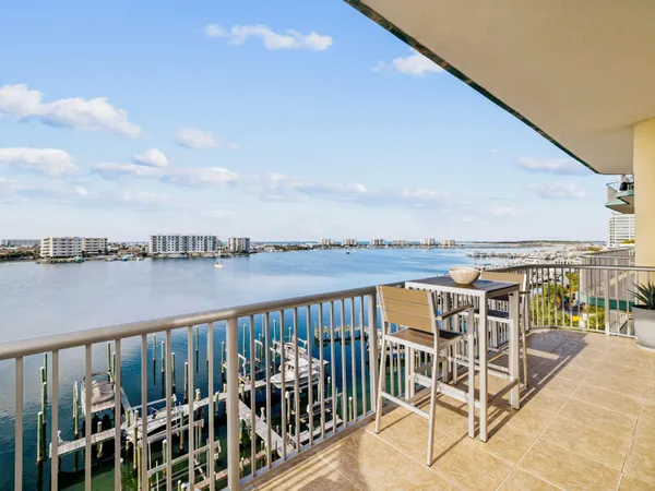 a view of a balcony with an ocean view