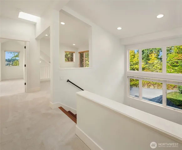 a view of hallway with a large window