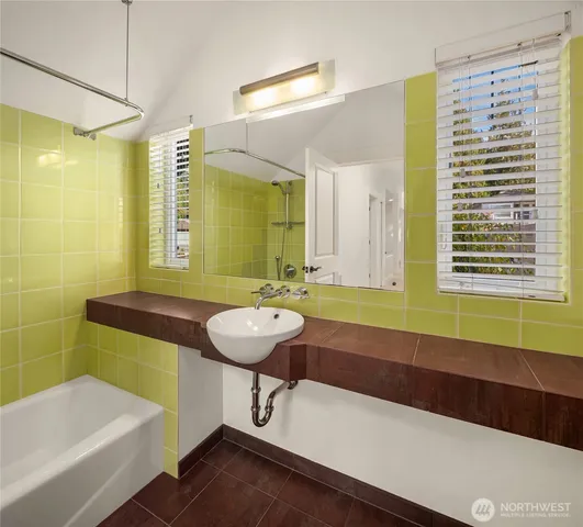 a bathroom with a sink and a bathtub