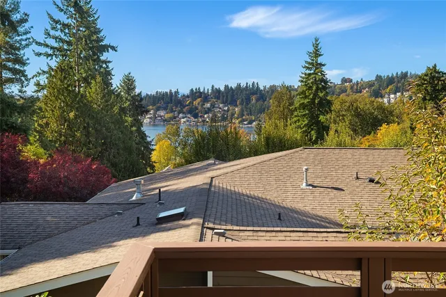 a view of roof and city view