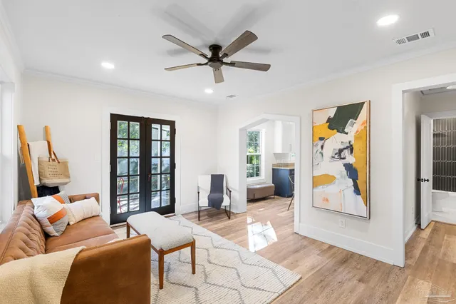 a living room with furniture and window