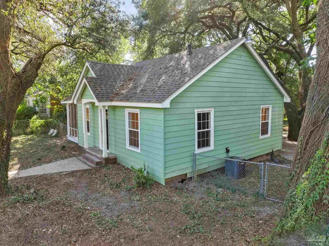 an aerial view of city and parking space