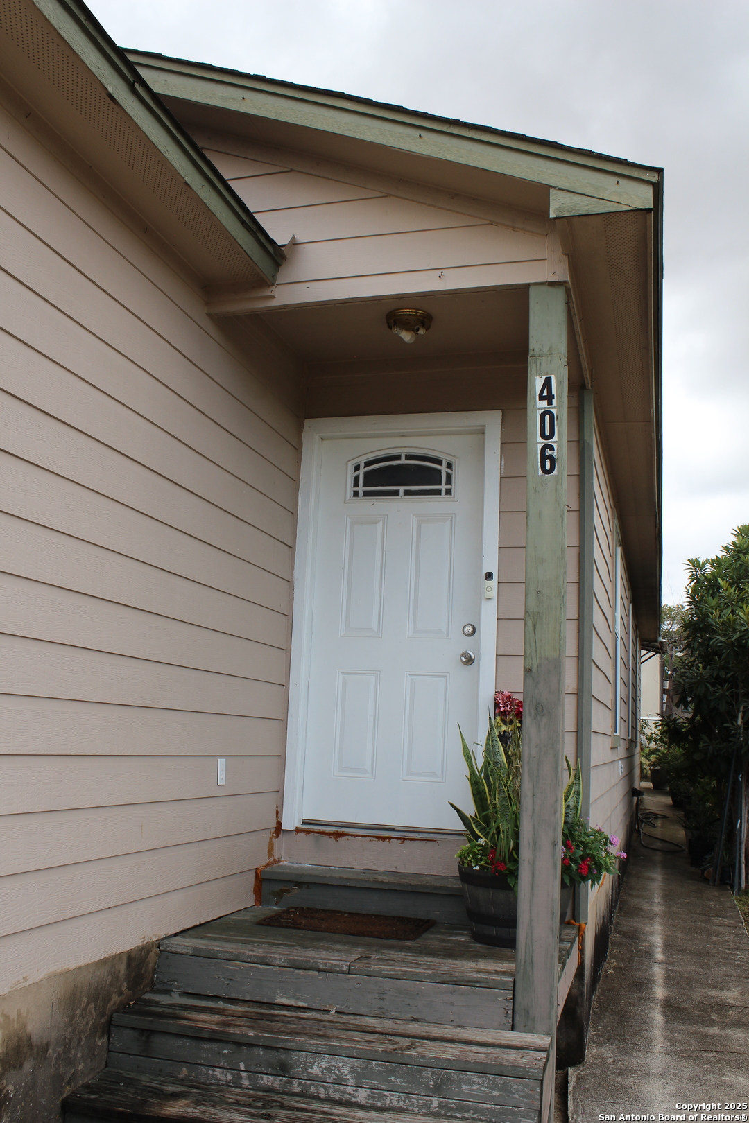 406 County Road 6850, Unit 1 Lytle, TX 78052 - Photo 1 of 24 a view of a door of the house